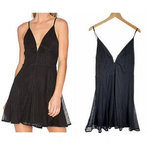 Revolve NBD Aida Dress in Black. Romantic Plunge Low Cut Neck Mini Dress. Large